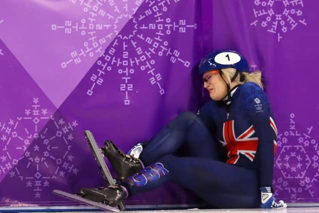 Elise Christie of Great Britain crashes out during the Ladies Short Track Speed Skating 1000m Heats. Picture; Getty