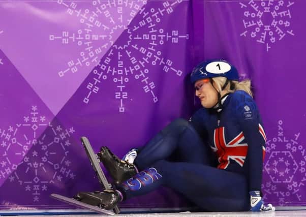 Elise Christie of Great Britain crashes out during the Ladies Short Track Speed Skating 1000m Heats. Picture; Getty