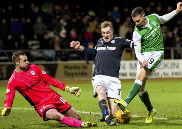 Jamie Maclaren has been getting into good positions, but has only netted once so far in his Hibs career. Pic: SNS