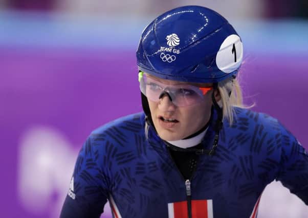Elise Christie shows her disappointment as her chances of Olympic glory disappeared for another four years. Pic: Getty