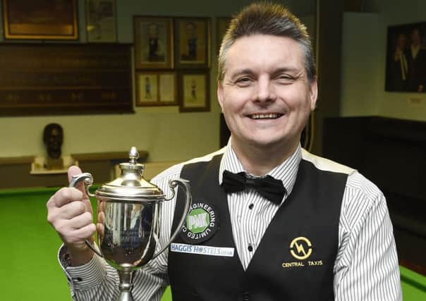 Craig MacGillivray shows off the East of Scotland Snooker Championship trophy. Pic: Greg Macvean