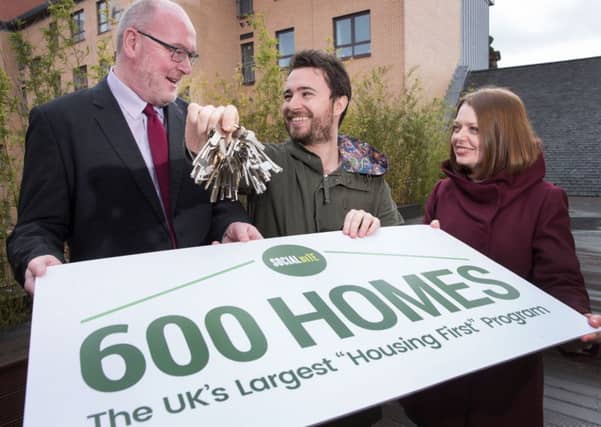 Martin Armstrong, chief executive of Wheatley Housing Group, Josh Littlejohn and Suzanne Fitzpatrick of Heriot Watt University launch the 600 Homes project, Picture: Steve Welsh
