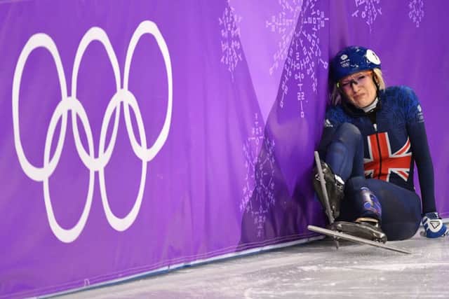 Elise Christie falls in the women's 1,000m short track speed skating heat event. Picture; Getty