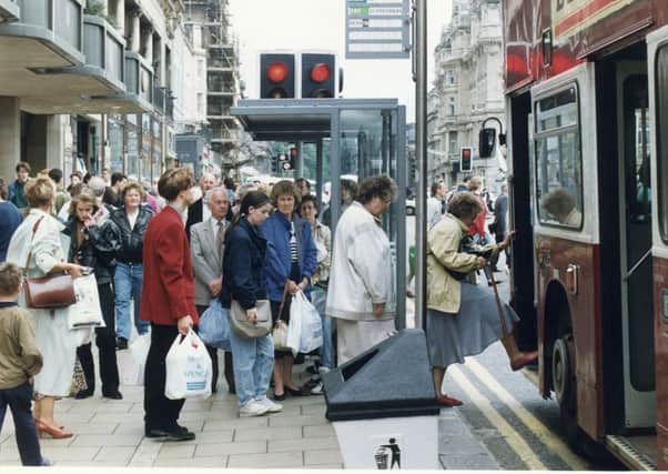 People getting on a LRT bus on Princes Street in Edinburgh in 1991. Picture: TSPL