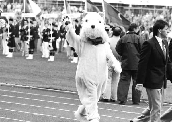 A Scottie dog mascot waves goodbye at the closing ceremony of the 1986 Commonwealth Games at Meadowbank