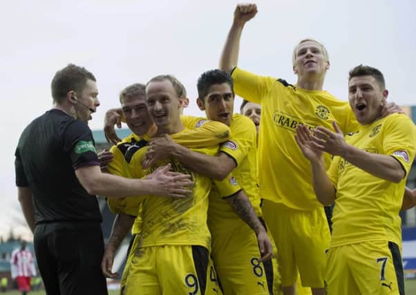 Leigh Griffiths, No.9, celebrates his hat-trick