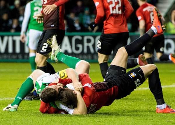 Hibs and Killie will battle it out in front of the Sky Sports cameras. Picture: SNS