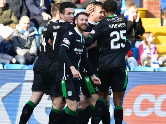 Hibs striker Florian Kamberi is mobbed by his team-mates having given the Easter Road side the lead after just 29 seconds against Kilmarnock