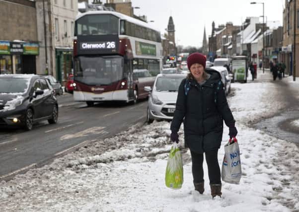 Lothian Buses kept running for as long as possible and were back on the streets quickly (Picture: Alistair Linford)