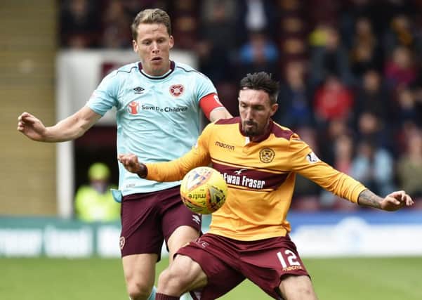 Hearts and Motherwell will square off for a place in the Scottish Cup semi-finals. Picture: SNS
