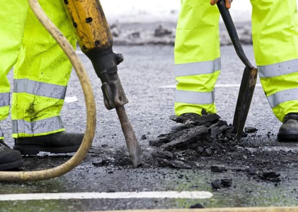 The vast majority of defects on Edinburgh's roads are down to historical sub-standard repairs by utilities companies. Picture: Ian Georgeson
