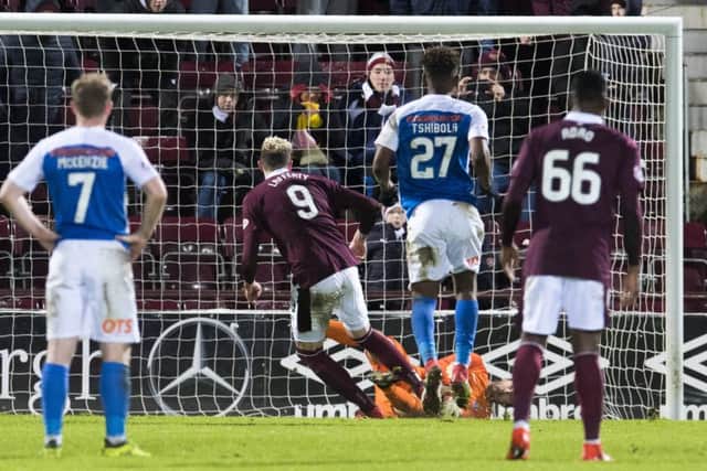 Kyle Lafferty watches on as his penalty is held by Kilmarnock stopper Jamie MacDonald. Pic: SNS