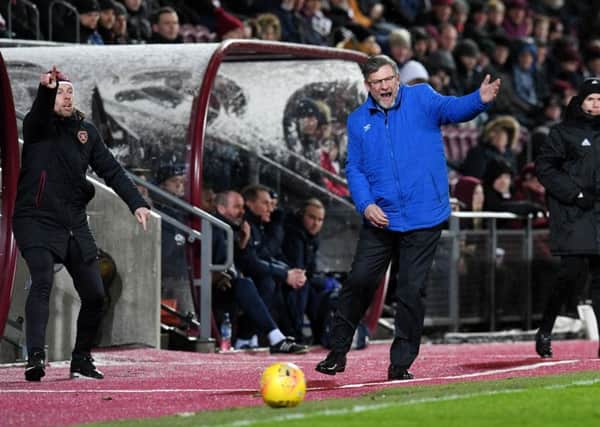 Hearts manager Craig Levein cuts a frustrated figure in the Hearts dugout during the 1-1 draw with Kilmarnock. Pic: SNS