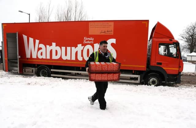 Bread is delivered in snowy conditions to Sainsbury's in Larbert. Picture: Andrew Milligan/PA Wire
