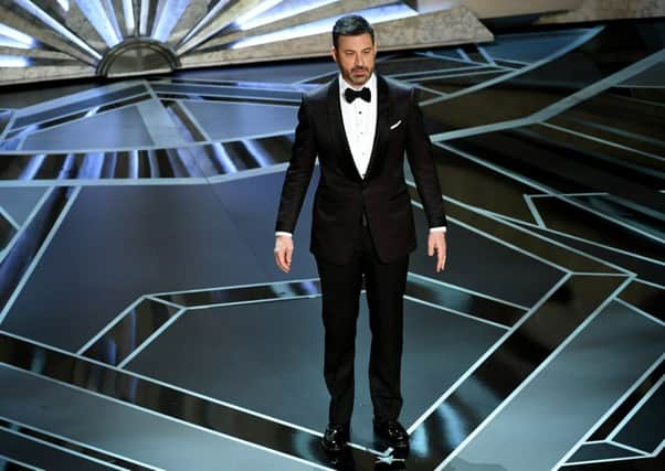 Host Jimmy Kimmel speaks addressed the scandal on stage.