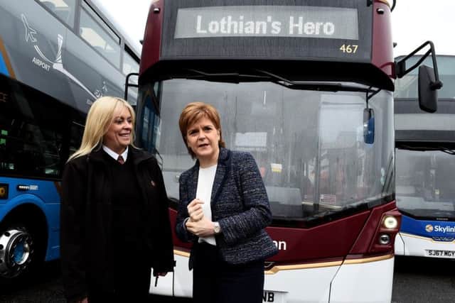 First Minister Nicola Sturgeon visits Lothian Buses central garage and met hero bus driver Charmaine Laurie, Picture: Lisa Ferguson