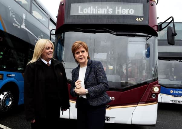 First Minister Nicola Sturgeon visits Lothian Buses central garage and met hero bus driver Charmaine Laurie, Picture: Lisa Ferguson