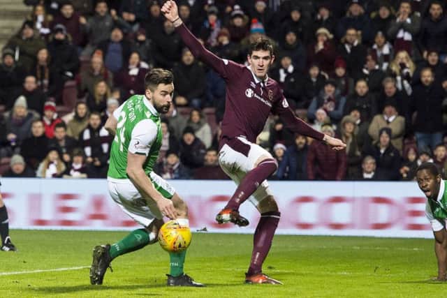 Kyle Lafferty and Darren McGregor will meet again on Friday. Pic: SNS