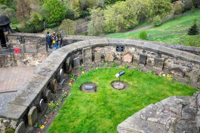More than 20 dogs are commemorated in the unusual dog cemetery within Edinburgh Castle's walls