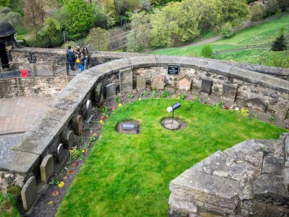 More than 20 dogs are commemorated in the unusual dog cemetery within Edinburgh Castle's walls