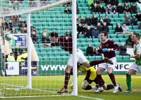 Ryan McGowan heads home for Hearts in a 3-1 win over Hibs at Easter Road in January 2012