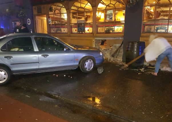 Car which ran into the Grays Mill pub in Slateford. Picture:  Peter Marinello