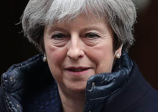 Theresa May has said her Government won't interfere over bank branch closures (Picture: AFP/Getty)