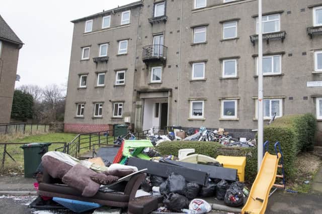 Property dumped in garden in front of an Edinburgh woman's flat when she came home to find she had been evicted. Picture: SWNS