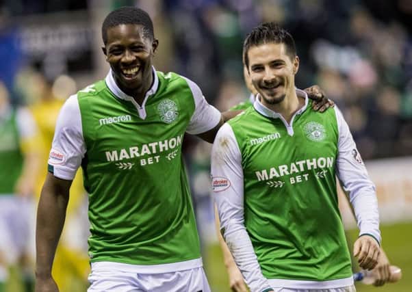 Marvin Bartley made his 100th appearance for Hibs in the derby in which Jamie Maclaren, right, scored