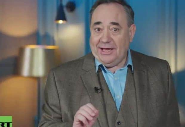 Alex Salmond has defended his decision to host a show on state-owned Russian TV channel, RT