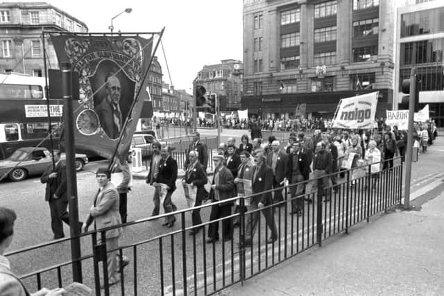 Demonstrators from Nalgo and other trade unions protesting about the cuts to the National Health Service in Edinburgh, September 1980. The marchers make their way up Lothian Road to the Caley cinema.