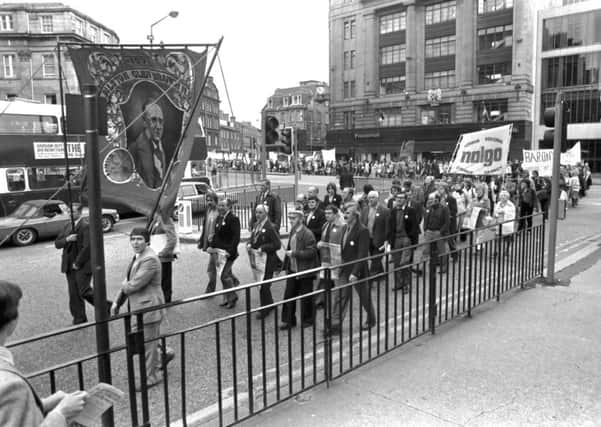 Demonstrators from Nalgo and other trade unions protesting about the cuts to the National Health Service in Edinburgh, September 1980. The marchers make their way up Lothian Road to the Caley cinema.