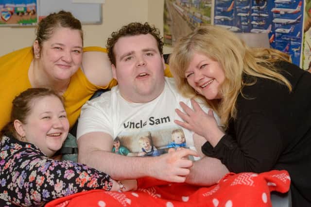 Team Sam: Jacqueline Higgin and Sam with carers Jannet Smith and Shannon Smith. Picture: Ian Georgeson