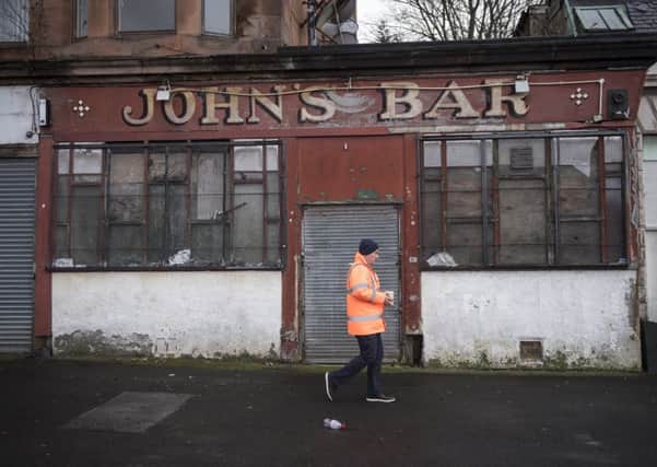 A Glasgow pub, one of many that has closed for business in recent years. Picture: John Devlin