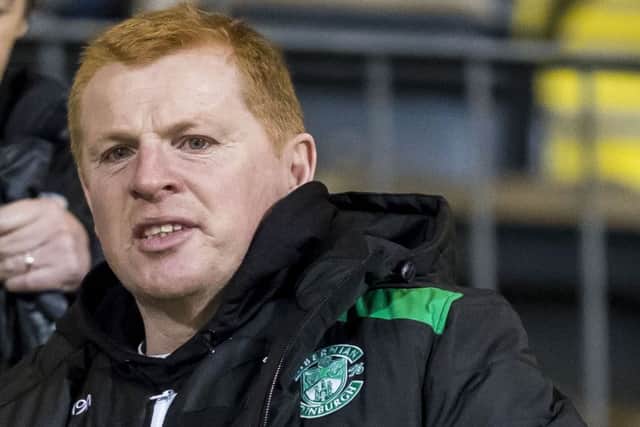 Neil Lennon watches from the stand