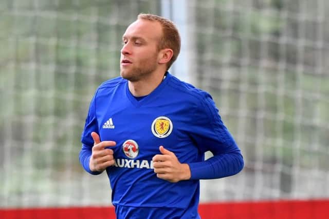 Dylan McGeouch joined up with the Scotland squad yesterday but was later forced to withdraw through injury. Pic: SNS