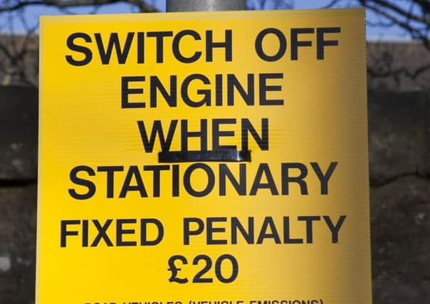 Warning sign outside James Gillespie Primary where a Â£20 fine can be issued for cars with the engine running
