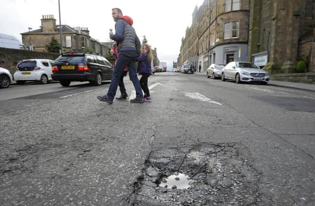 A total of 2,220 kilometres of A-road in Scotland was in need of repairs, the analysis found, while a further 2,571 of B-road required attention. Picture: Neil Hanna