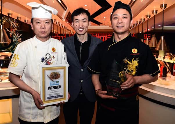 Staff at China Red accept their award