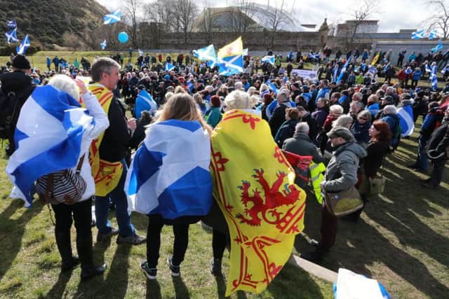 Protesters encircled the Scottish Parliament in Edinburgh, Picture by Stewart Attwood