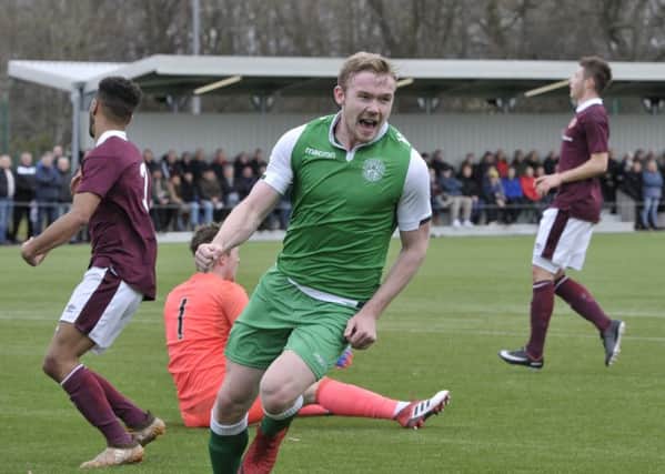 Lewis Allan celebrates scoring his second goal for Hibs. Pic: Ian Rutherford