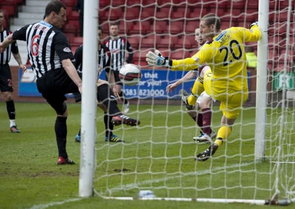 Gary Glen, right, opens the scoring for Hearts