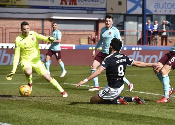 Sofien Moussa equalises for Dundee against Hearts. Pic: SNS