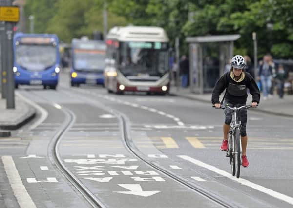 A cyclist heading  East to West on Princes Street. Picture: Neil Hanna