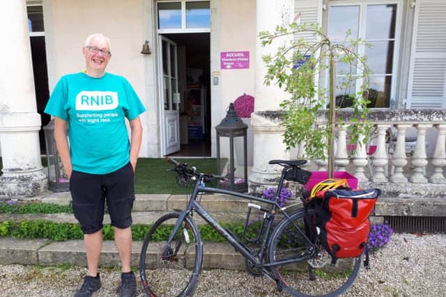 Andy Wallace on a charity ride with the bicycle that has since been stolen