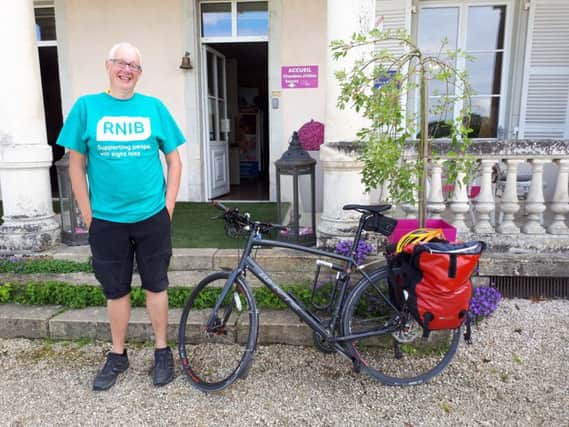 Andy Wallace on a charity ride with the bicycle that has since been stolen