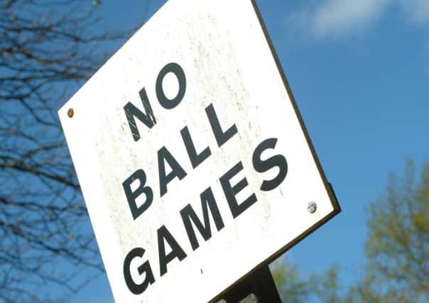 Scots councils are being urged to take down 'No Ball Games' signs