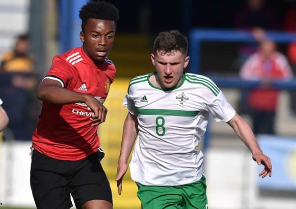 Bobby Burns (right) in action for Northern Ireland U18s against Manchester United U18s in the 2017 NI Super Cup. Picture: Getty Images