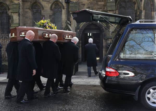 The coffin of Cardinal Keith O'Brien arrives for his funeral at the Church of St Michael in Newcastle. Picture: Owen Humphreys/PA Wire