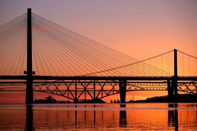 Sunrise over the Firth of Forth in South Queensferry. Picture: Jane Barlow/PA Wire